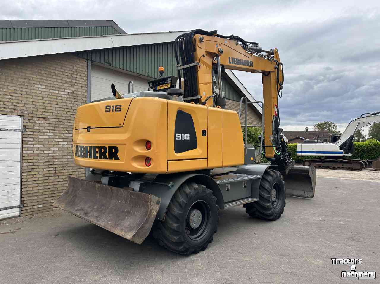 Excavator mobile Liebherr A916 met draaikantelstuk