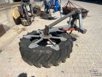 Feed sweeper wheel  Aandrukband